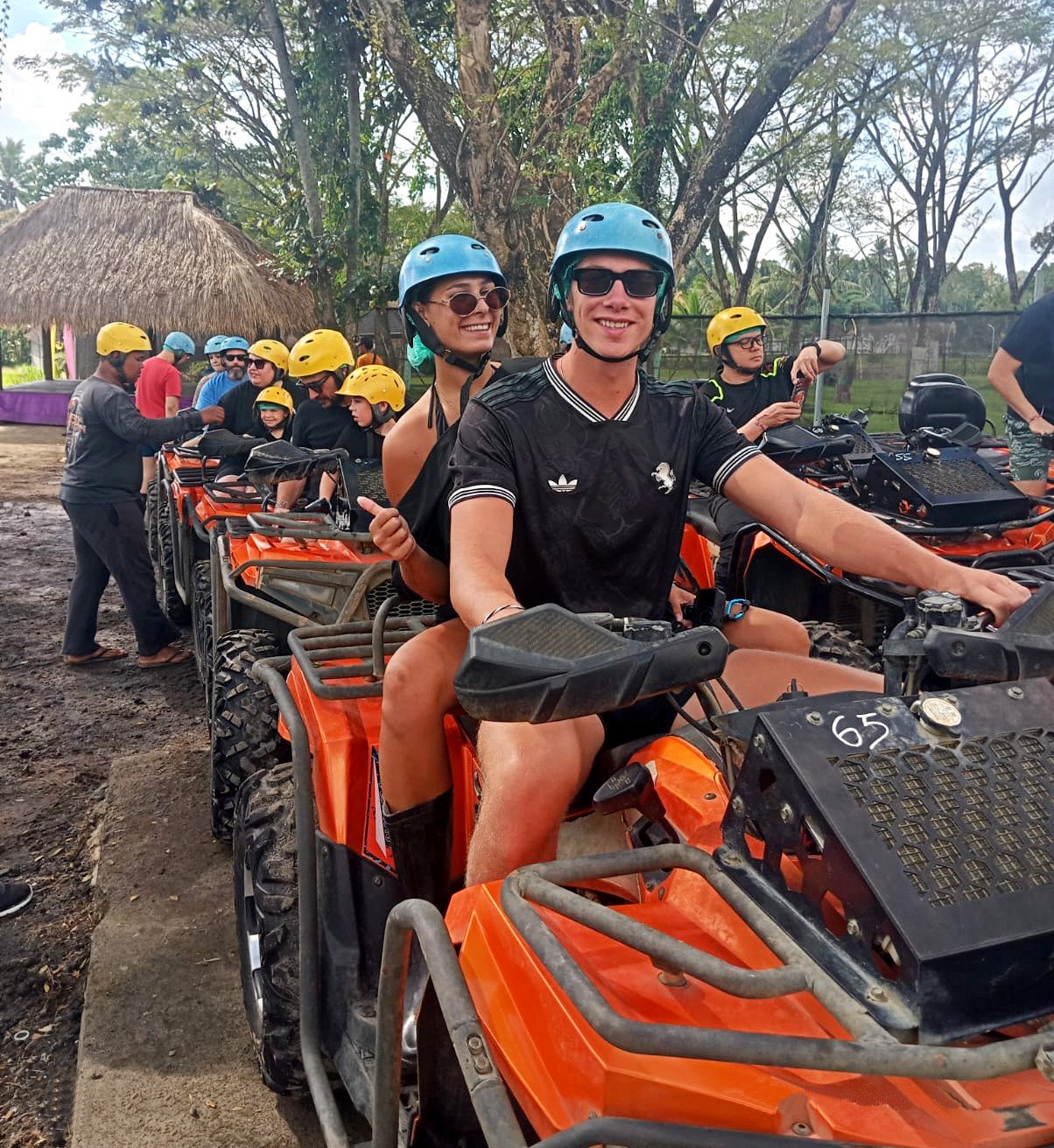 Couple on a tandem ATV quad bike in Bali